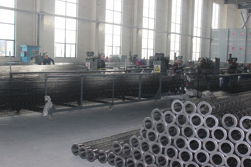 1750207776126324.jpg 袋笼喷涂车间.jpg